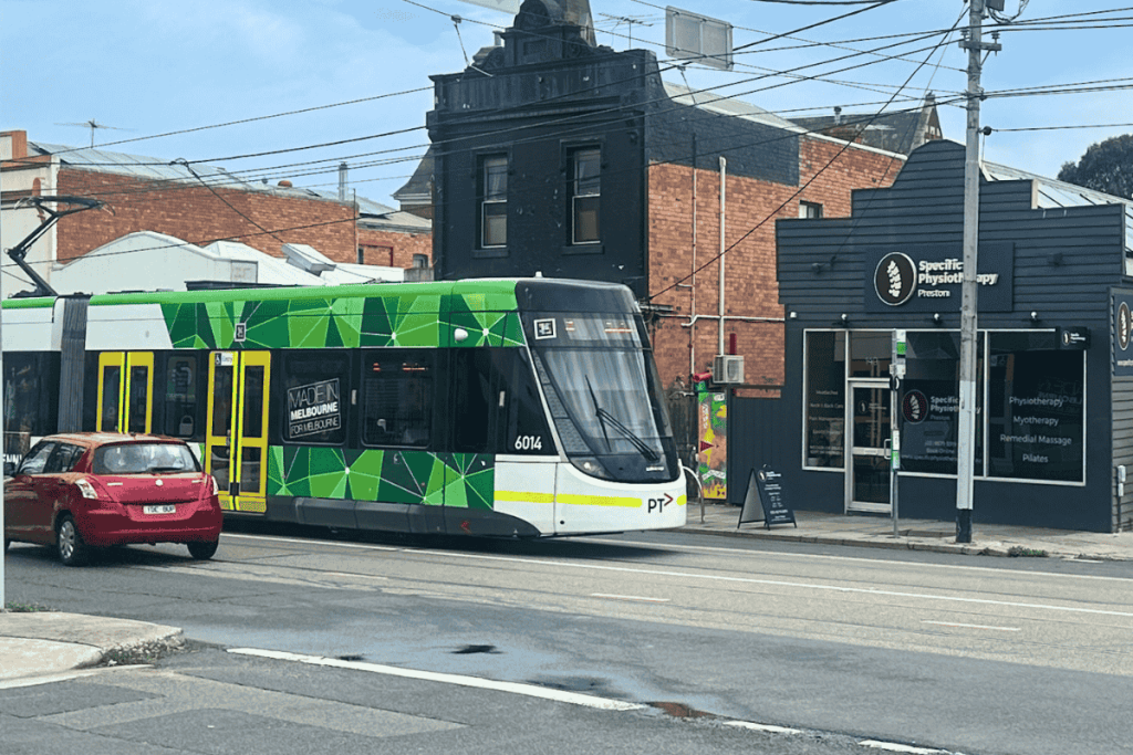 Melbourne Route 86 tram in Preston, Victoria, highlighting daily commutes that can cause neck strain